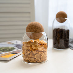 Jar filled with granola, built for dry goods like nuts and cereal
