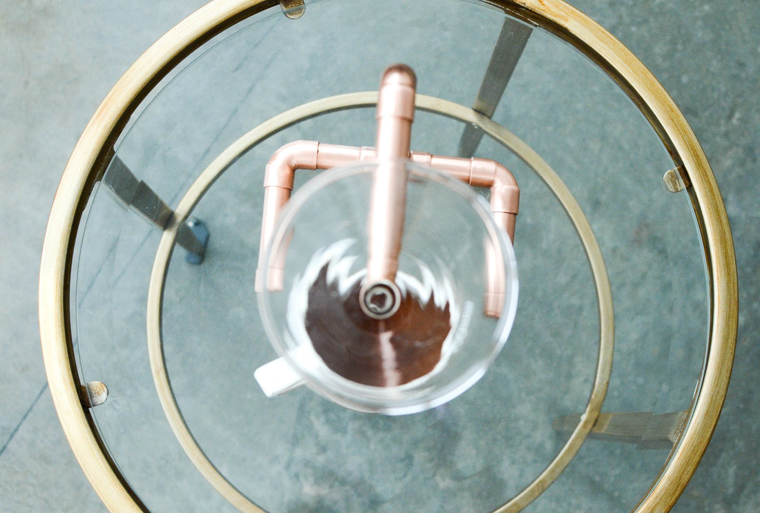 Slow Pour — Hand-Polished Copper Coffee Stand